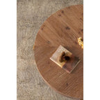Table basse ronde moderne rétro à empiècements avec pieds croisés