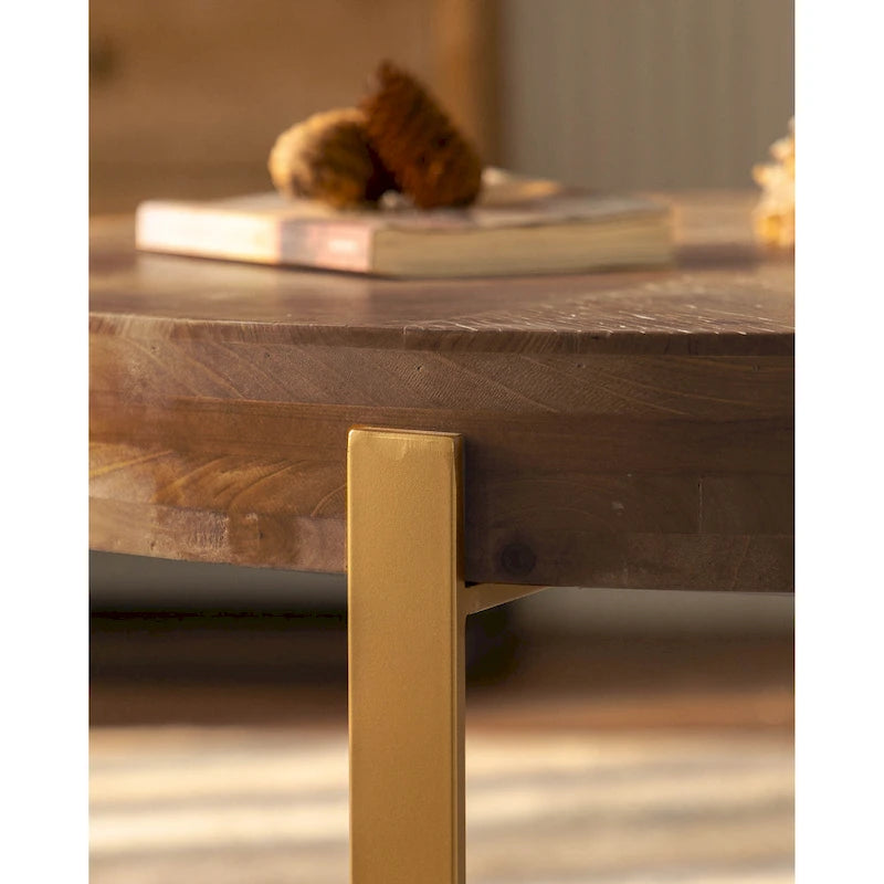 Table basse ronde moderne rétro à empiècements avec pieds croisés