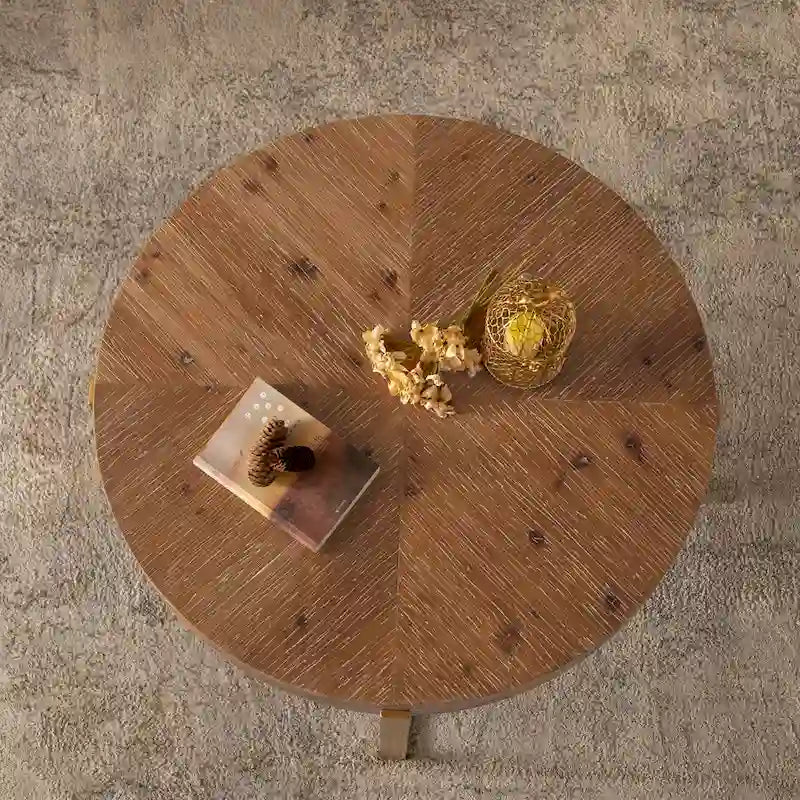 Table basse ronde moderne rétro à empiècements avec pieds croisés