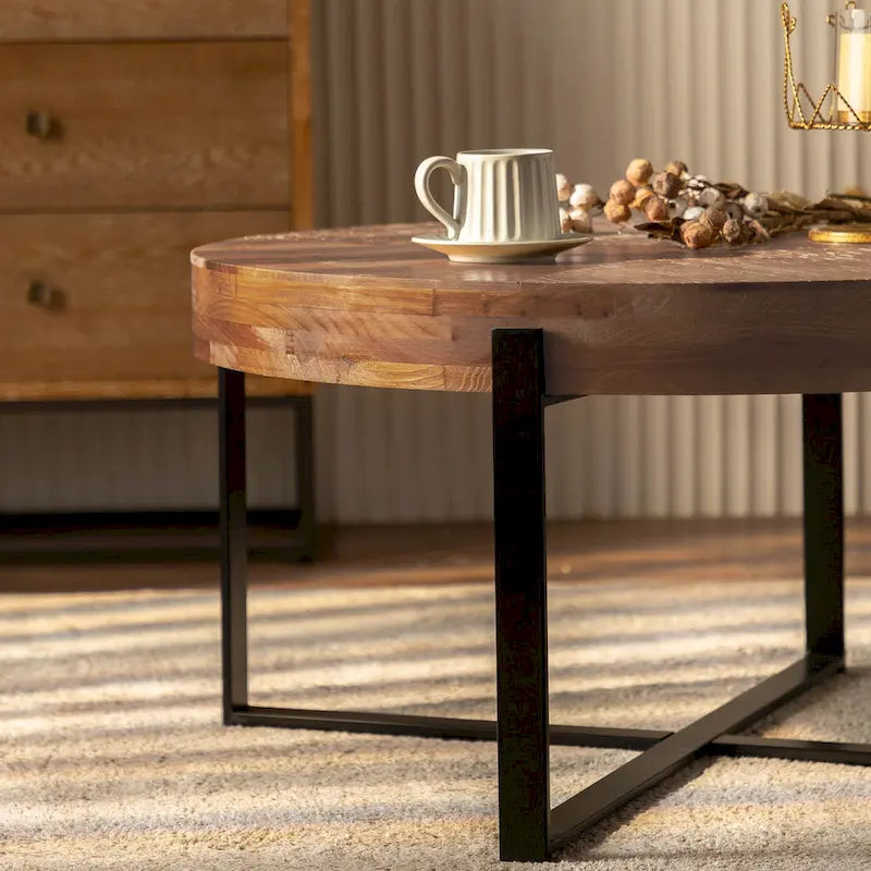 Table basse ronde moderne rétro à empiècements avec pieds croisés