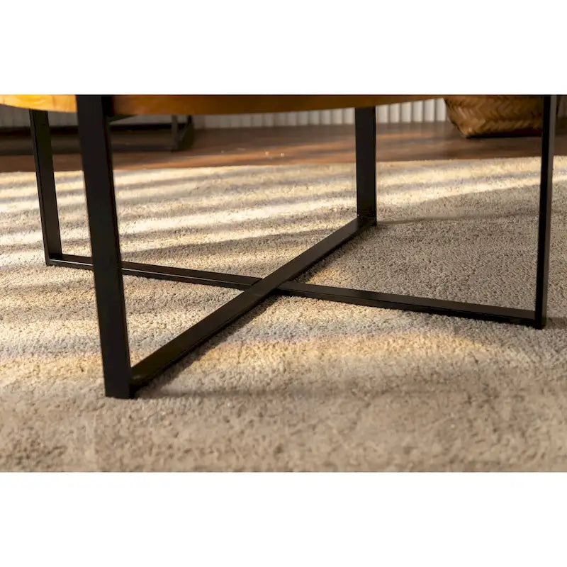 Table basse ronde moderne rétro à empiècements avec pieds croisés